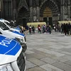 Köln: Verhaftung no der terroristescher Alerte beim Doum | © picture alliance/dpa | Horst Galuschka