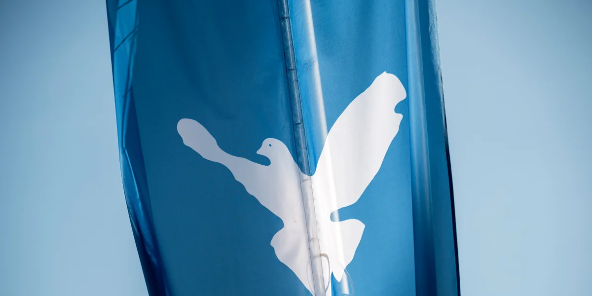 Friddensdauf Symbol | © picture alliance/dpa | Daniel Vogl