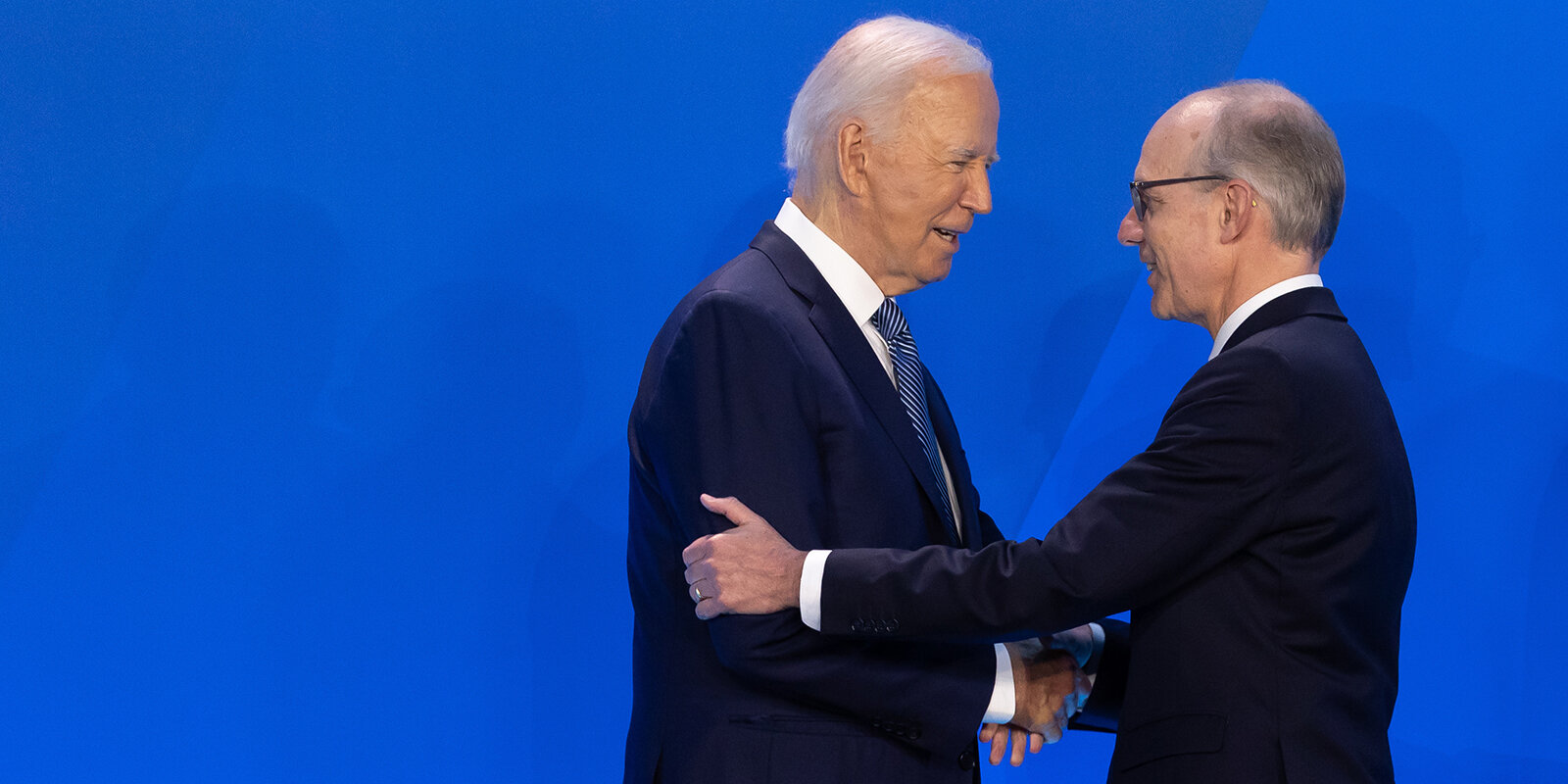 De Luc Frieden an den Joe Biden um NATO Treffen den 10. Juli 2024 | © SIP / Julien Warnand