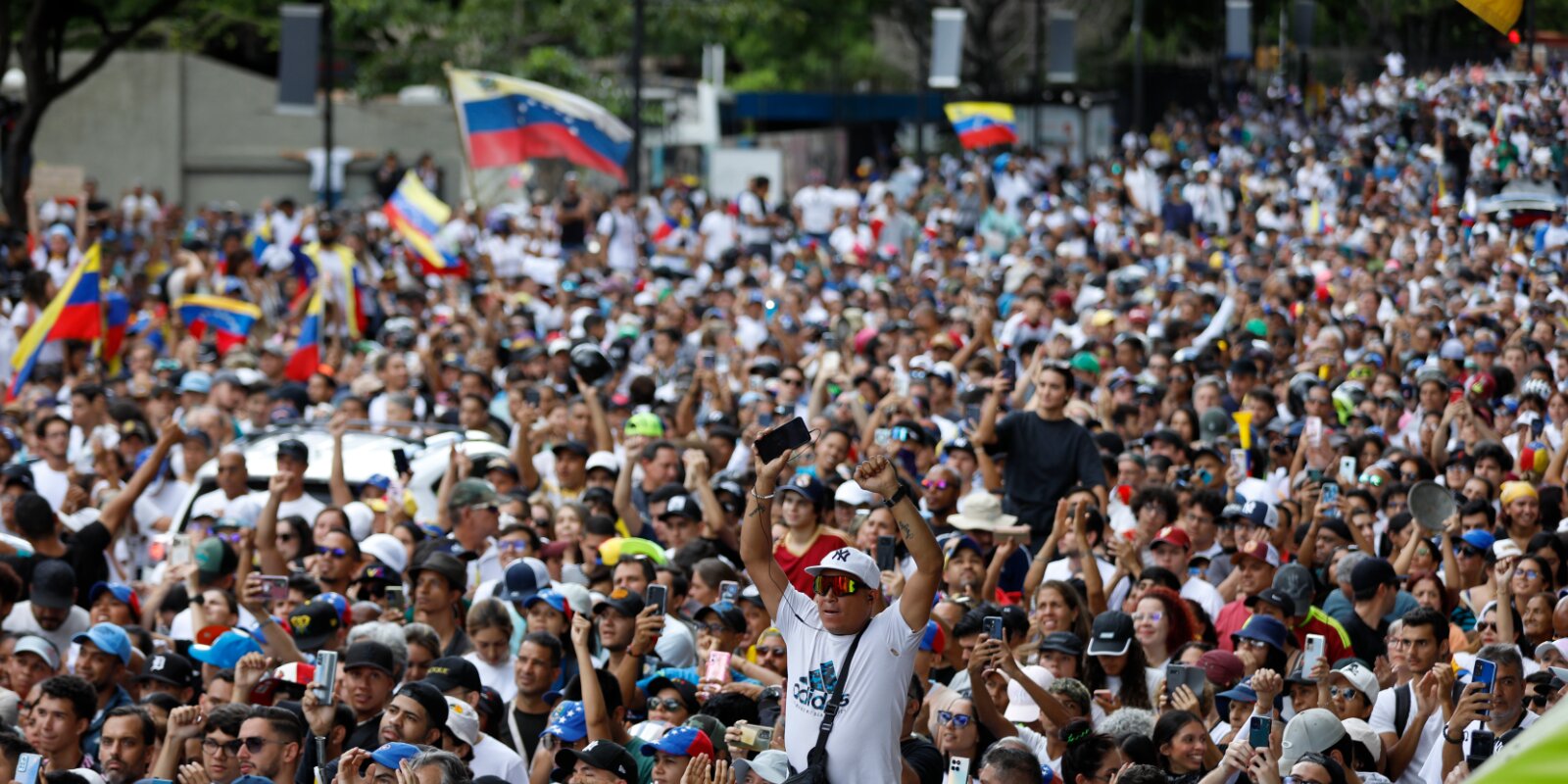 Protester zu Caracas | © picture alliance/dpa | Jeampier Arguinzones