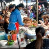 Postkaart aus Laos vum Guy Helminger (3) Iessen a Geeschter